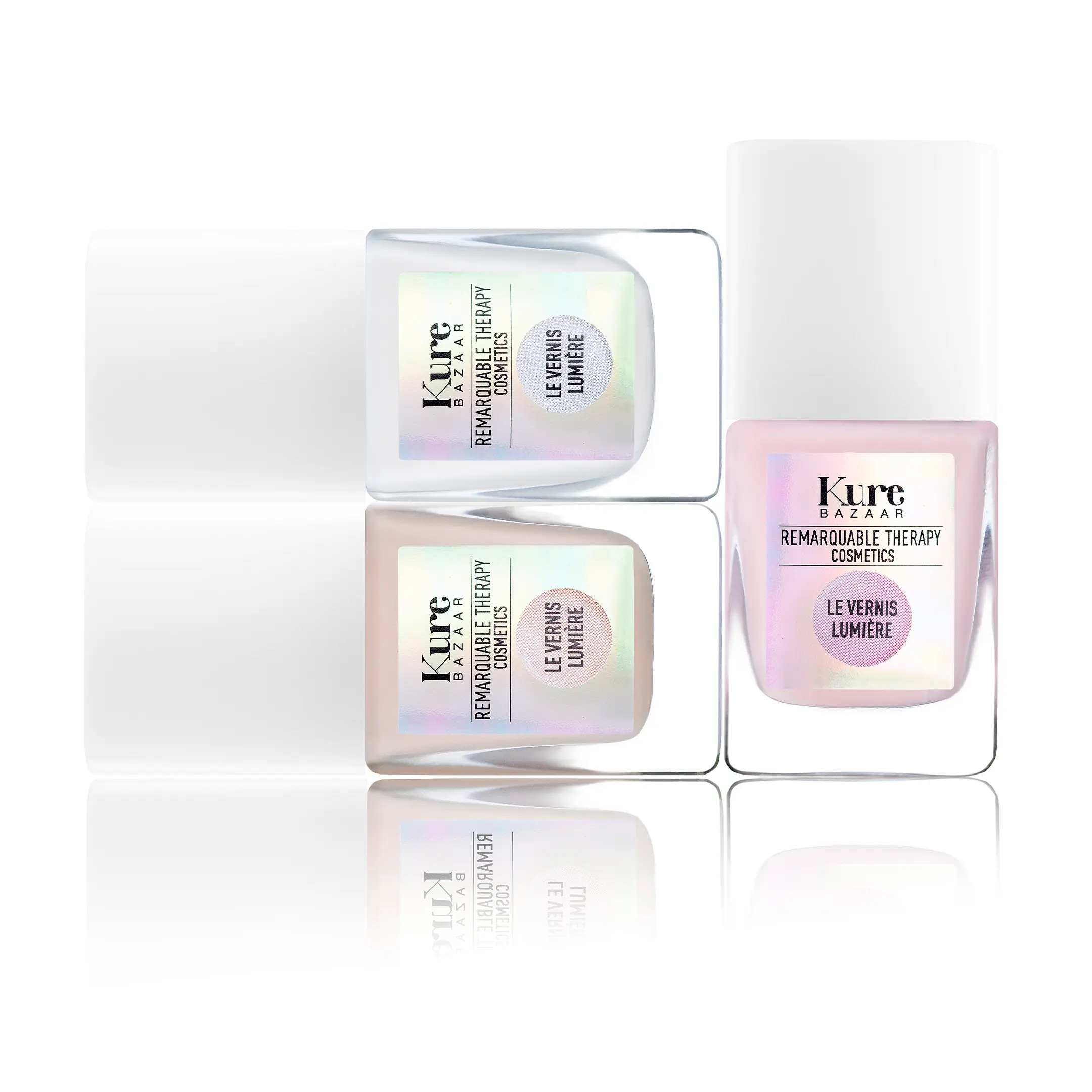 Iluminador de uñas Kure Bazaar Illuminateur Rose en tono rosado iridiscente, fórmula clean beauty.
